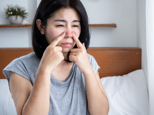 Woman with sinus problem and needs sinus relief