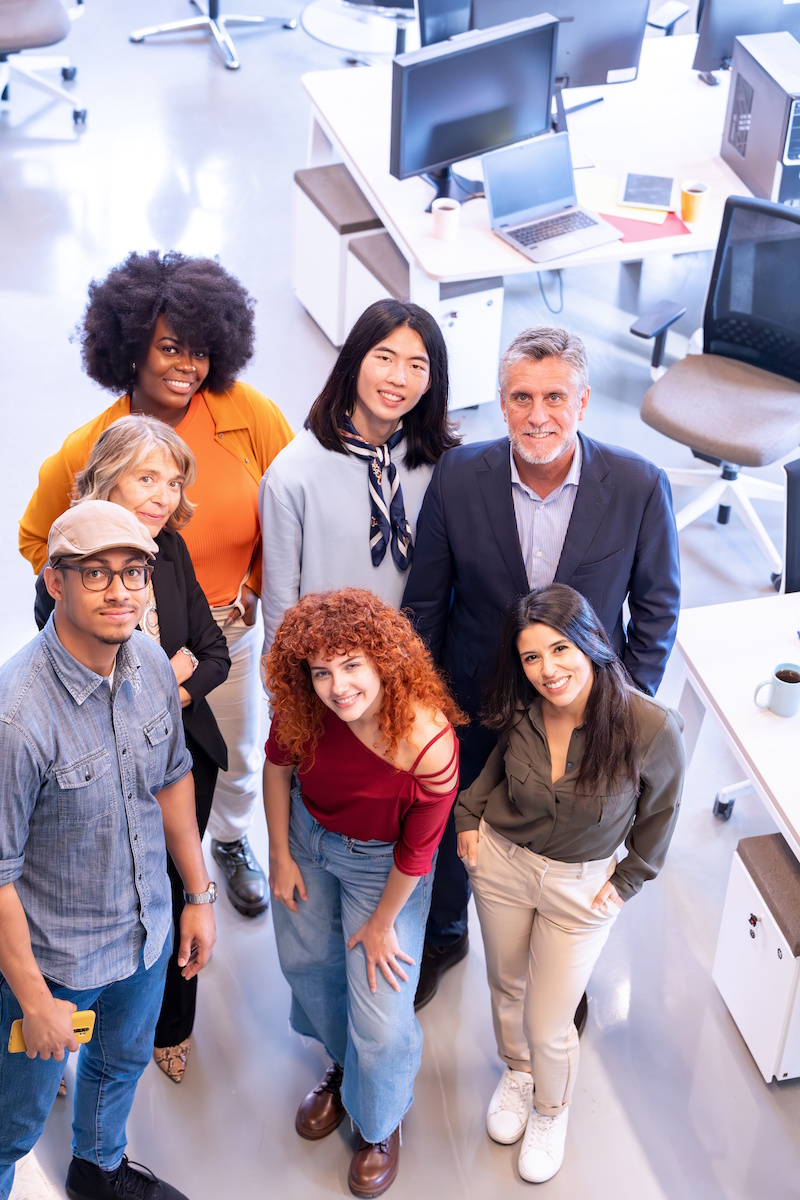 Diverse business team smiling while posing togethe 2024 12 02 01 35 30 utc